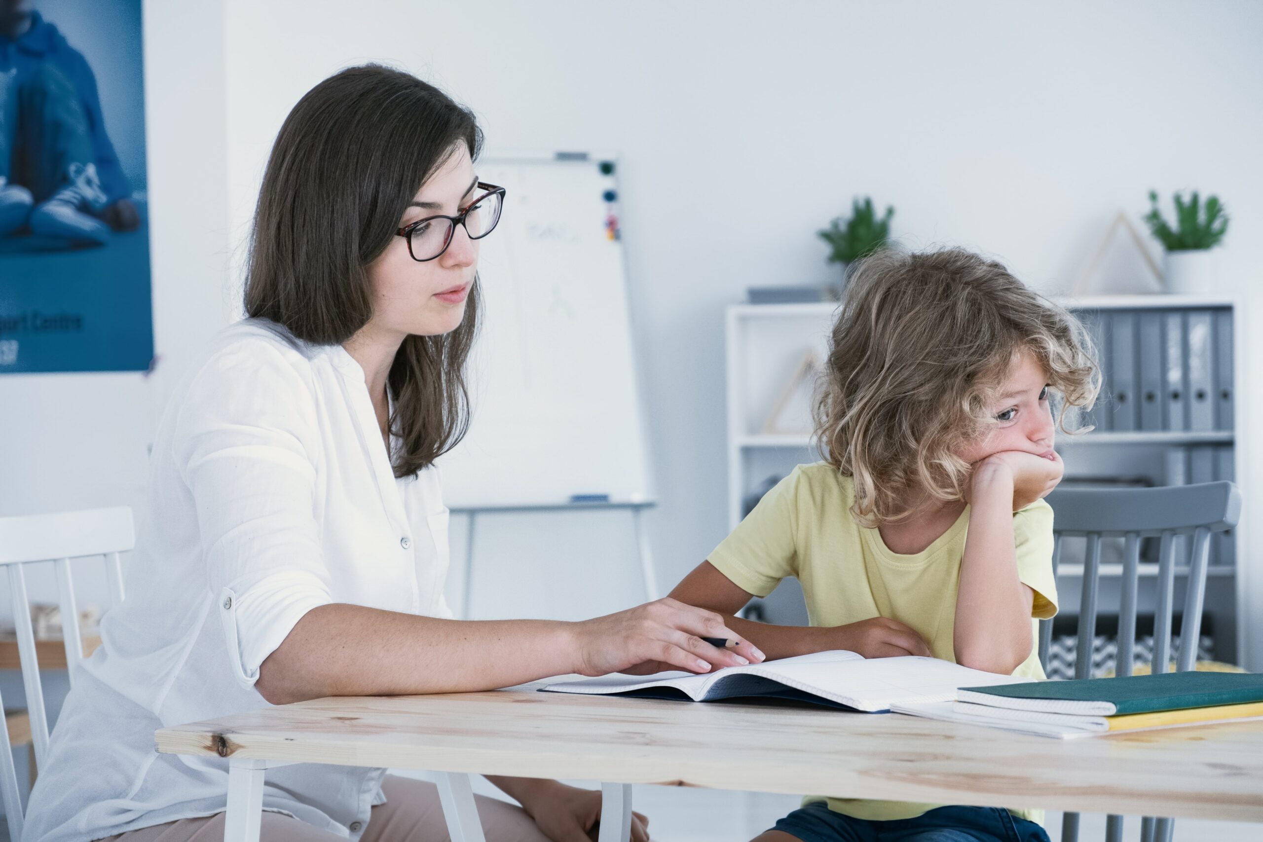 Manage ADHD in children, mother trying to get child to do homework