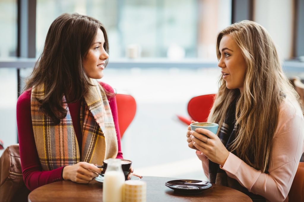two women chatting over coffee, r u ok suicide prevention campaign