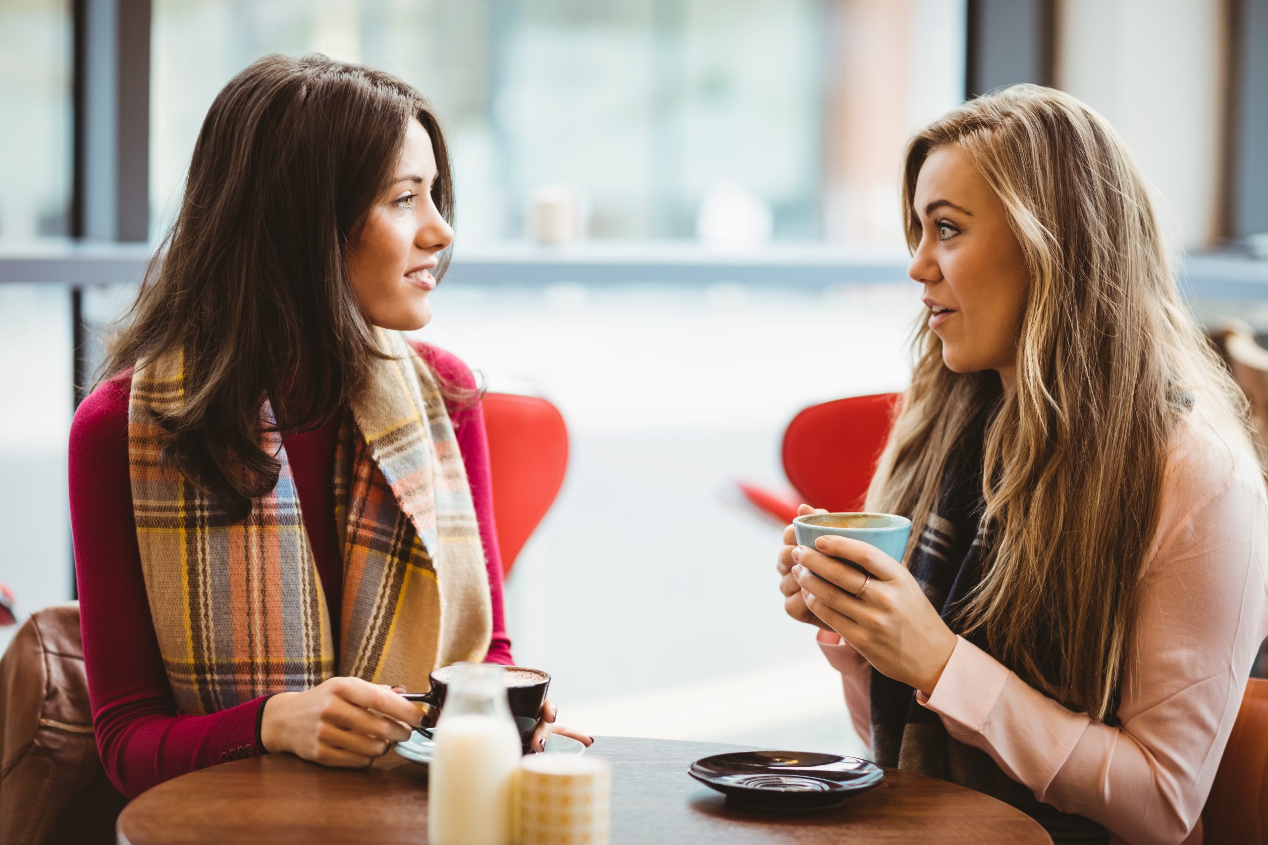 two women chatting over coffee, r u ok suicide prevention campaign
