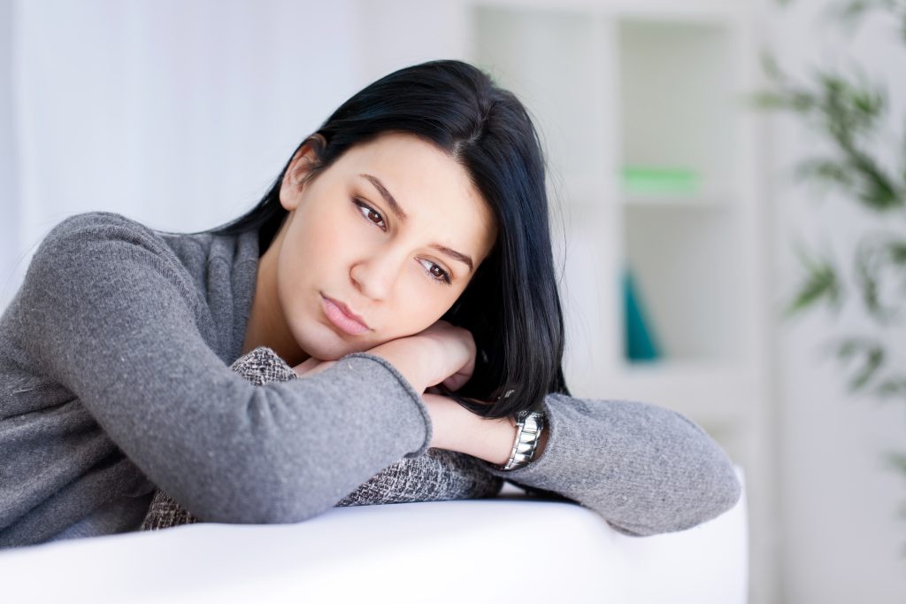 How to Stop Ruminating and Relax Your Mind 12 Stop ruminating, woman deep in thought