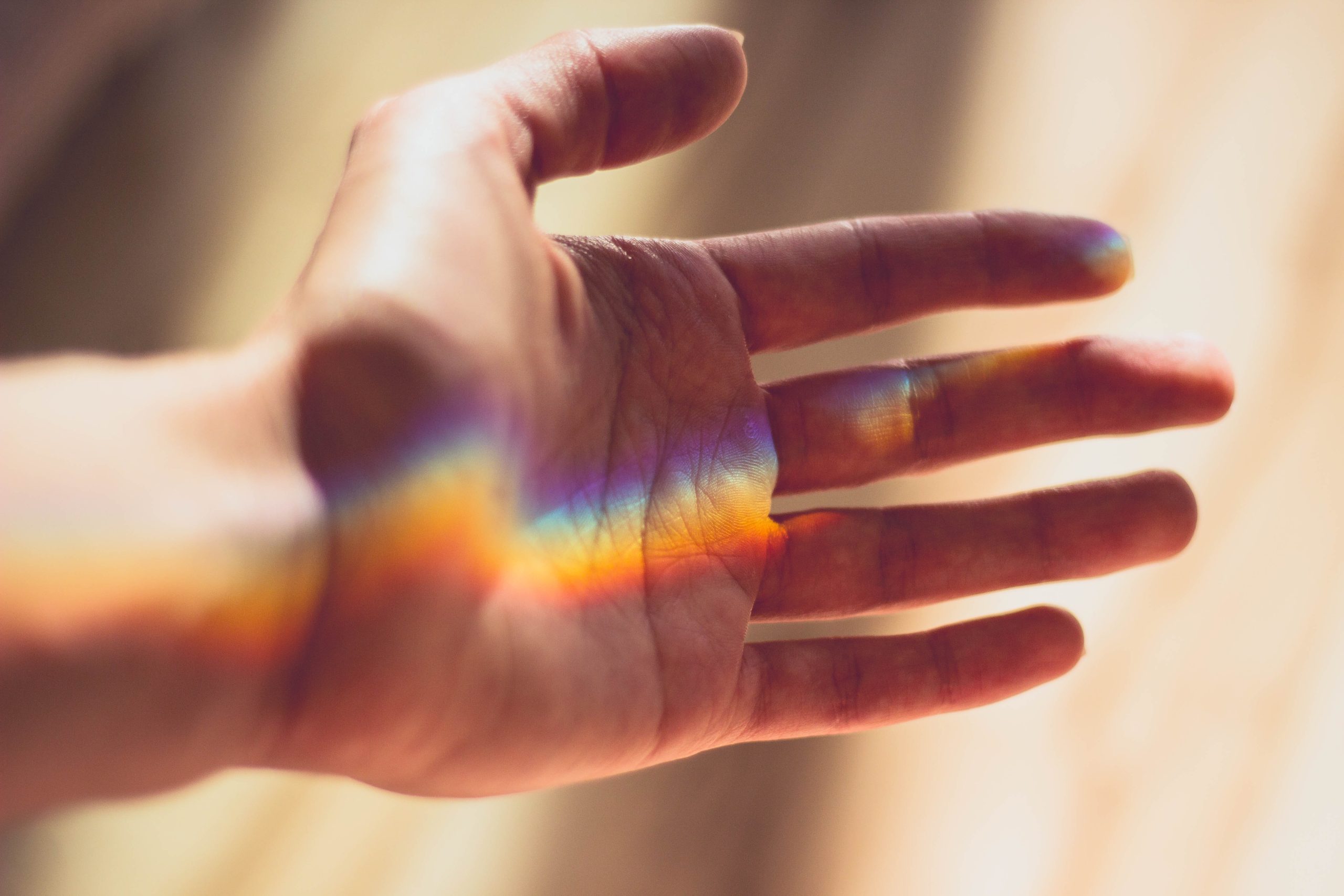 supporting LGBT children, pic of rainbow on hand