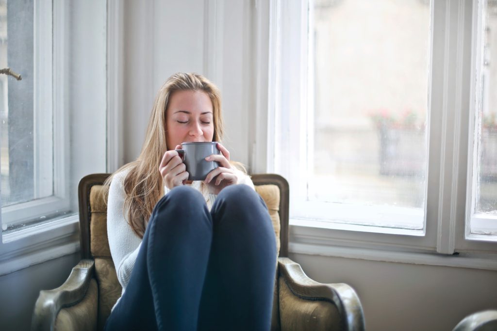 woman relaxing at home, stress free home tips