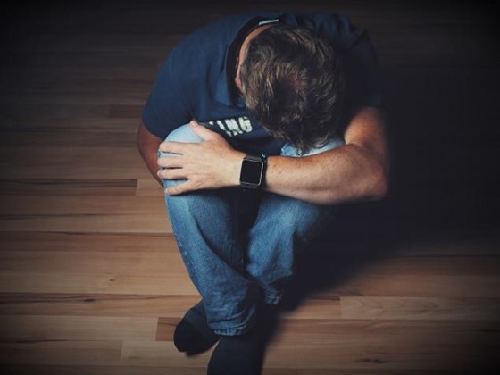 coping with grief, sad man