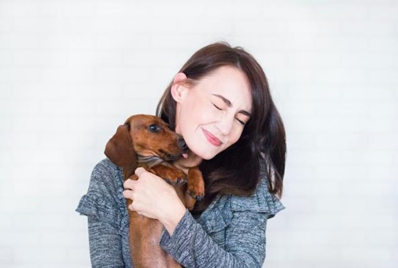 mental health benefits of pets, woman holding dog